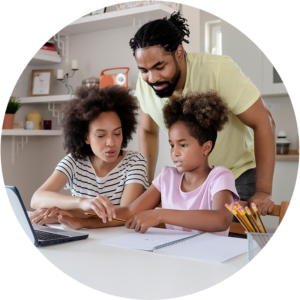 photo of young girl online learning with the help of her parents